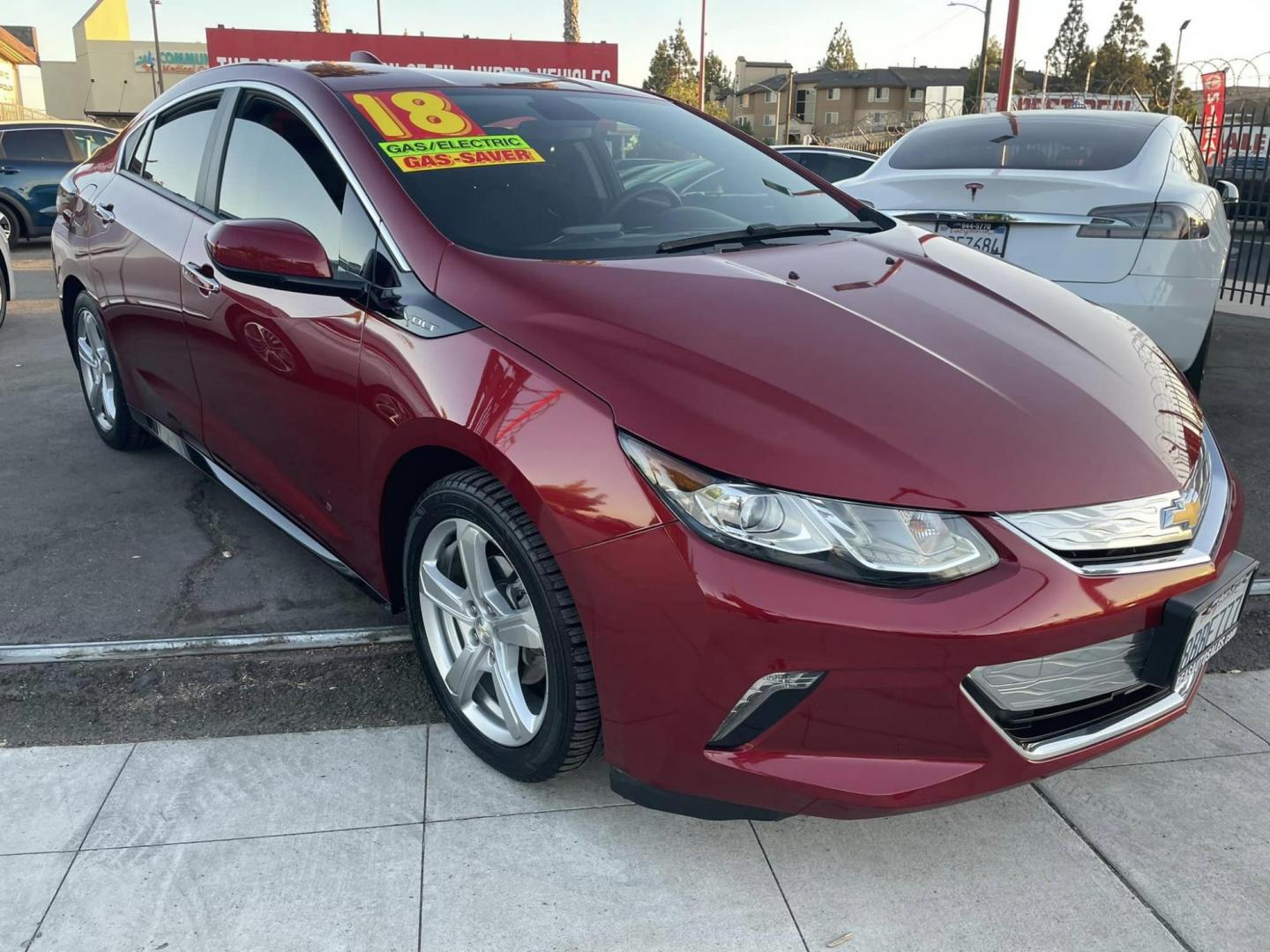 2018 RED Chevrolet Volt LT (1G1RC6S56JU) with an 1.5L L4 DOHC 16V engine, CVT transmission, located at 744 E Miner Ave, Stockton, CA, 95202, (209) 944-5770, 37.956863, -121.282082 - PLUS TAXES AND FEES - Photo#0