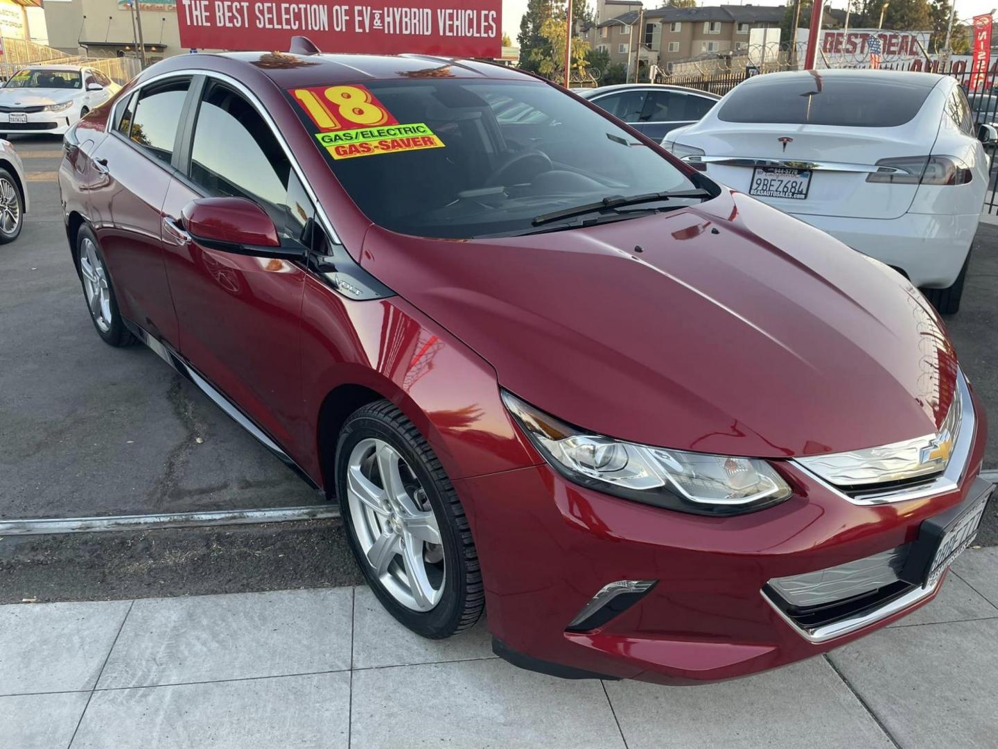 2018 RED Chevrolet Volt LT (1G1RC6S56JU) with an 1.5L L4 DOHC 16V engine, CVT transmission, located at 744 E Miner Ave, Stockton, CA, 95202, (209) 944-5770, 37.956863, -121.282082 - PLUS TAXES AND FEES - Photo#1