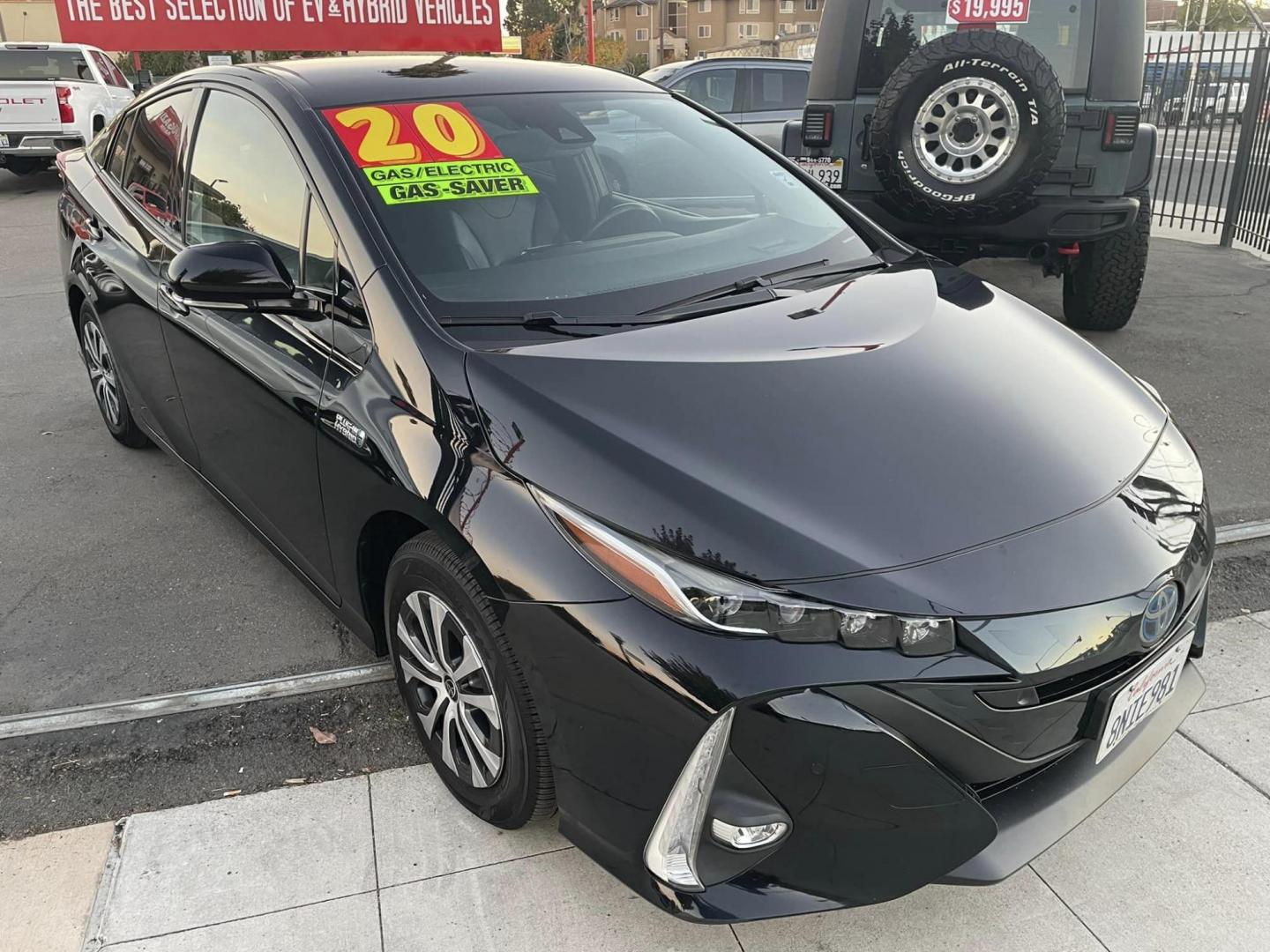 2020 RED /BLACK Toyota Prius Prime XLE (JTDKARFP9L3) with an 1.8L L4 DOHC 16V HYBRID engine, CVT transmission, located at 744 E Miner Ave, Stockton, CA, 95202, (209) 944-5770, 37.956863, -121.282082 - PLUS TAXES AND FEES - Photo#1