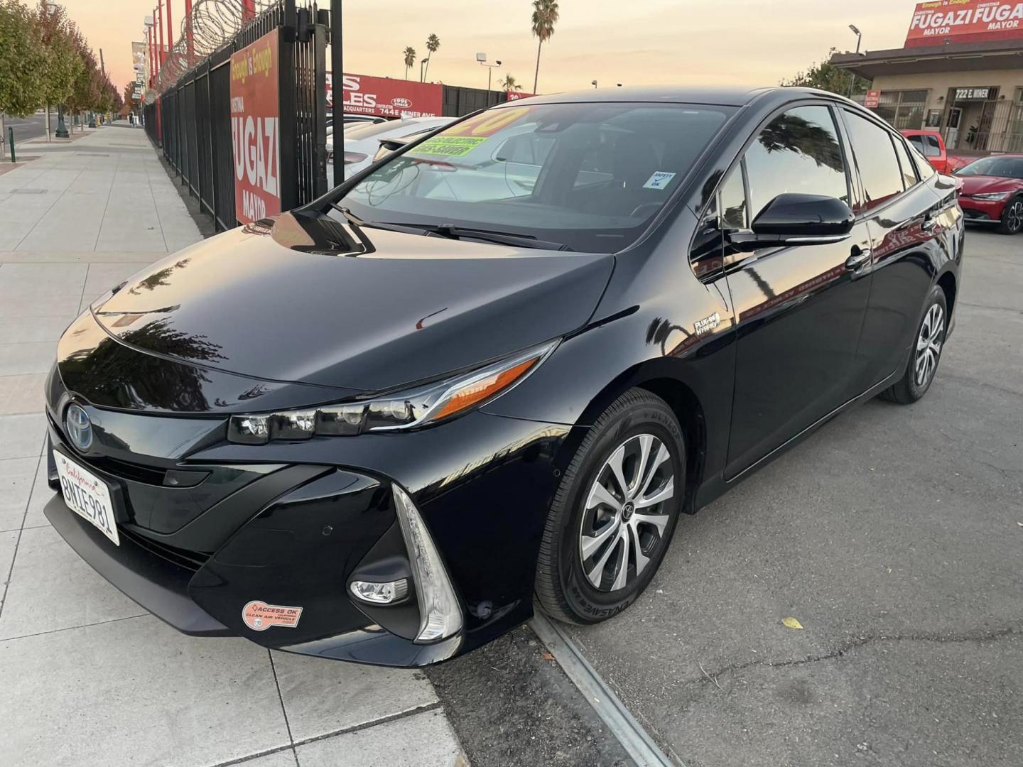 2020 RED /BLACK Toyota Prius Prime XLE (JTDKARFP9L3) with an 1.8L L4 DOHC 16V HYBRID engine, CVT transmission, located at 744 E Miner Ave, Stockton, CA, 95202, (209) 944-5770, 37.956863, -121.282082 - PLUS TAXES AND FEES - Photo#3