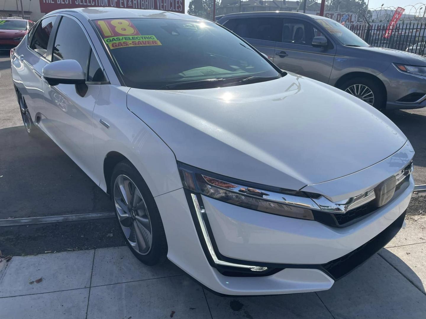 2018 Honda Clarity Plug-In Hybrid (JHMZC5F16JC) with an 1.5L L4 DOHC 16V HYBRID engine, CVT transmission, located at 744 E Miner Ave, Stockton, CA, 95202, (209) 944-5770, 37.956863, -121.282082 - PLUS TAXES AND FEES - Photo#1