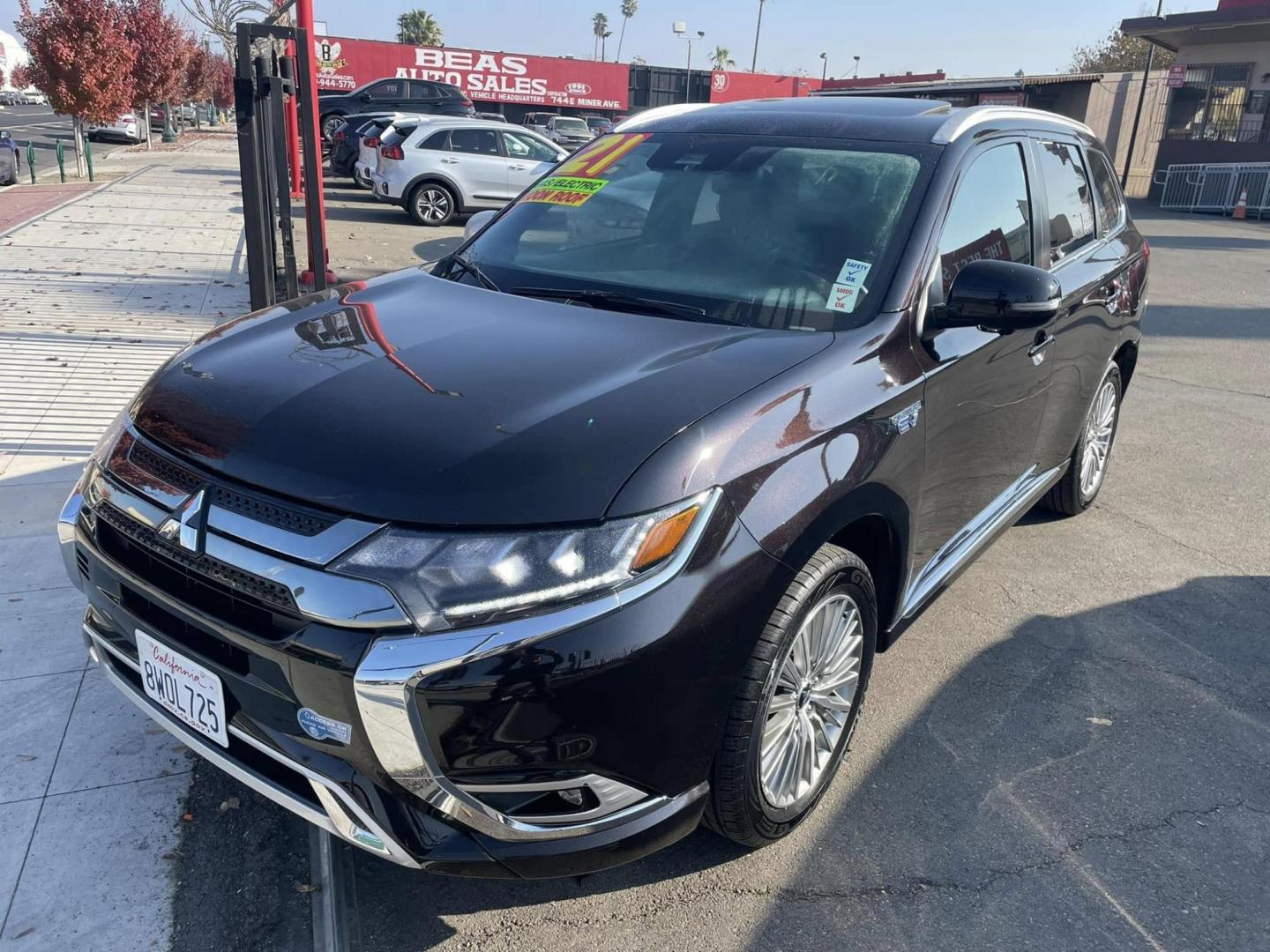 2021 BLACK Mitsubishi Outlander PHEV SEL (JA4J2VA72MZ) with an 2.0L L4 DOHC 16V HYBRID engine, 1A transmission, located at 744 E Miner Ave, Stockton, CA, 95202, (209) 944-5770, 37.956863, -121.282082 - PLUS TAXES AND FEES - Photo#2