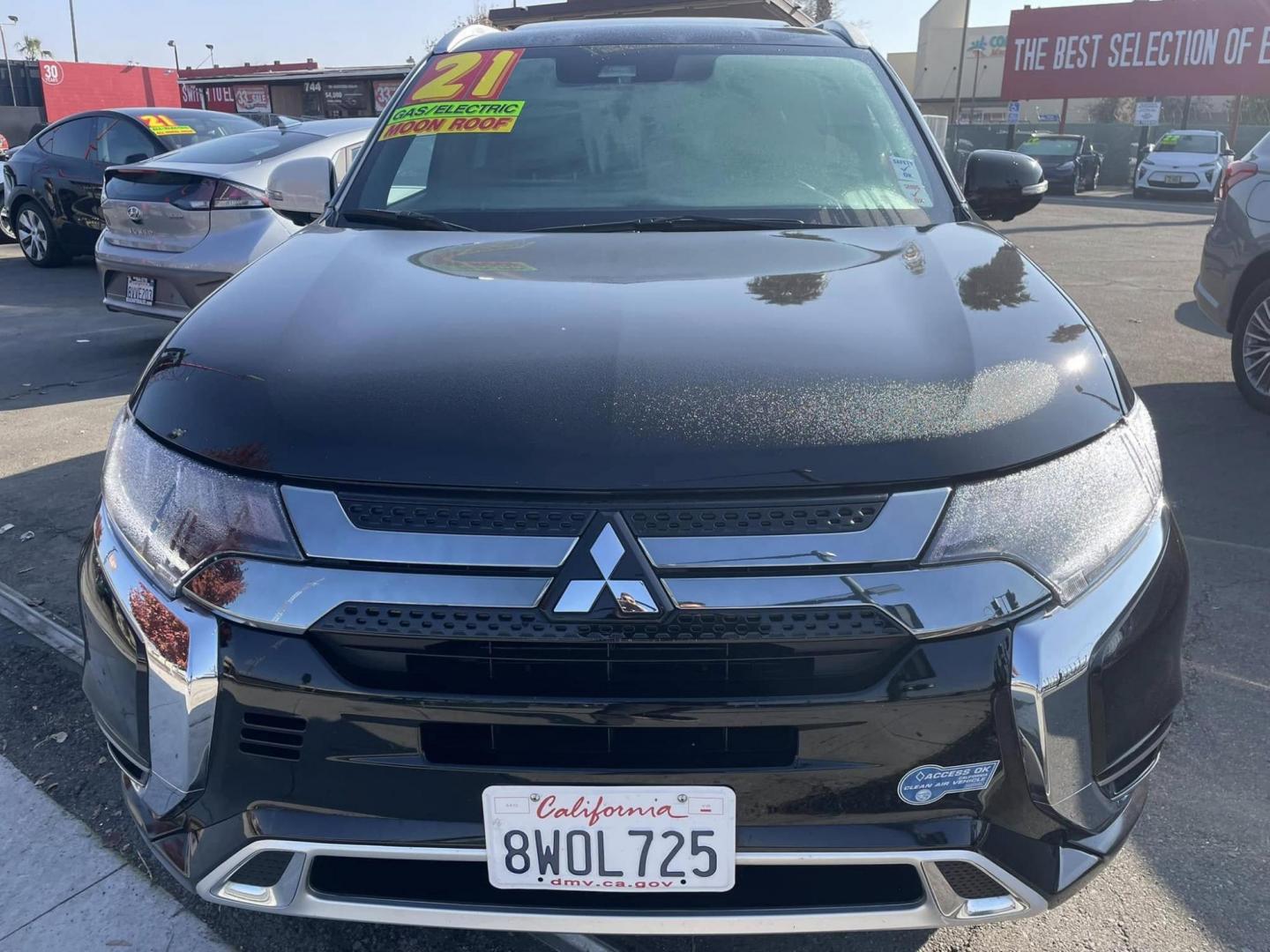 2021 BLACK Mitsubishi Outlander PHEV SEL (JA4J2VA72MZ) with an 2.0L L4 DOHC 16V HYBRID engine, 1A transmission, located at 744 E Miner Ave, Stockton, CA, 95202, (209) 944-5770, 37.956863, -121.282082 - PLUS TAXES AND FEES - Photo#1