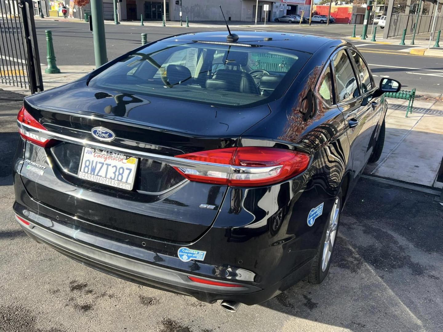 2018 BLACK Ford Fusion Energi SE (3FA6P0PU4JR) with an 2.0L L4 DOHC 16V HYBRID engine, CVT transmission, located at 744 E Miner Ave, Stockton, CA, 95202, (209) 944-5770, 37.956863, -121.282082 - PLUS TAXES AND FEES - Photo#11