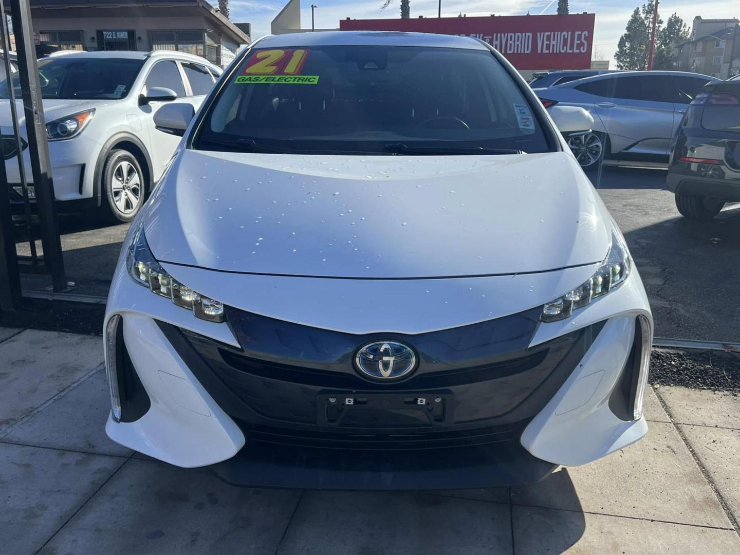 2021 WHITE Toyota Prius Prime LE (JTDKAMFP6M3) with an 1.8L L4 DOHC 16V HYBRID engine, CVT transmission, located at 744 E Miner Ave, Stockton, CA, 95202, (209) 944-5770, 37.956863, -121.282082 - PLUS TAXES AND FEES - Photo#1