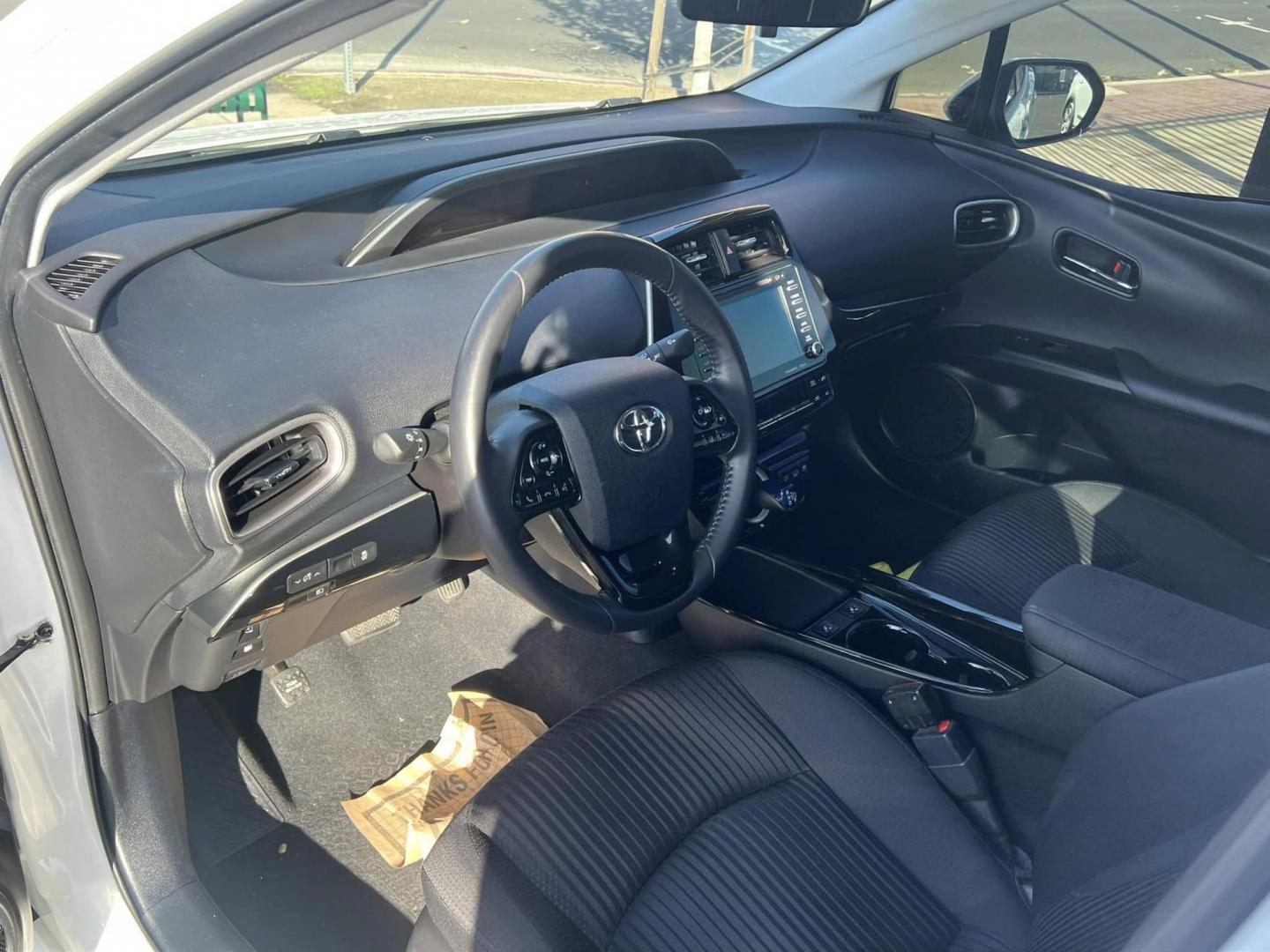 2021 WHITE Toyota Prius Prime LE (JTDKAMFP6M3) with an 1.8L L4 DOHC 16V HYBRID engine, CVT transmission, located at 744 E Miner Ave, Stockton, CA, 95202, (209) 944-5770, 37.956863, -121.282082 - PLUS TAXES AND FEES - Photo#4