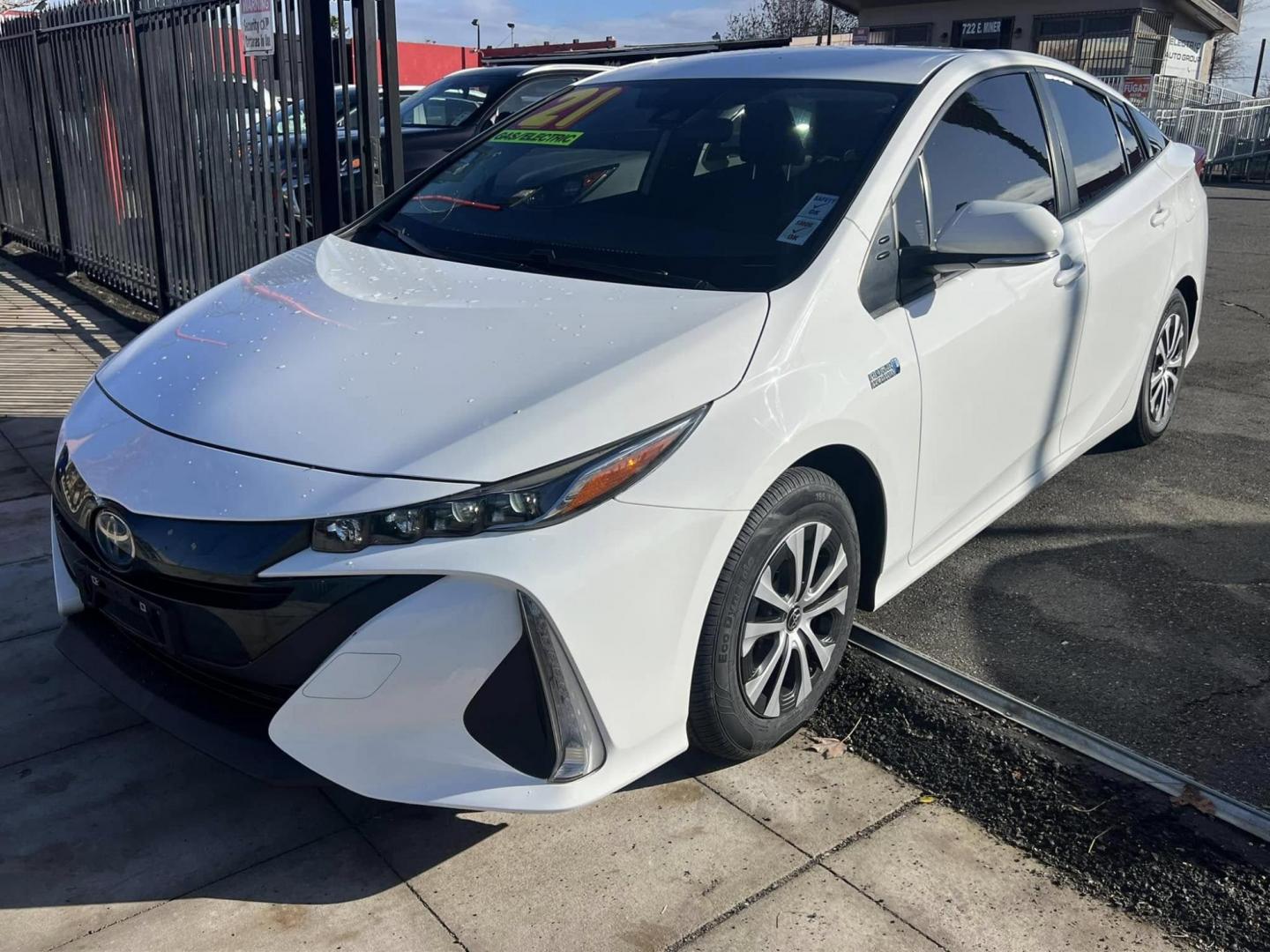 2021 WHITE Toyota Prius Prime LE (JTDKAMFP6M3) with an 1.8L L4 DOHC 16V HYBRID engine, CVT transmission, located at 744 E Miner Ave, Stockton, CA, 95202, (209) 944-5770, 37.956863, -121.282082 - PLUS TAXES AND FEES - Photo#2