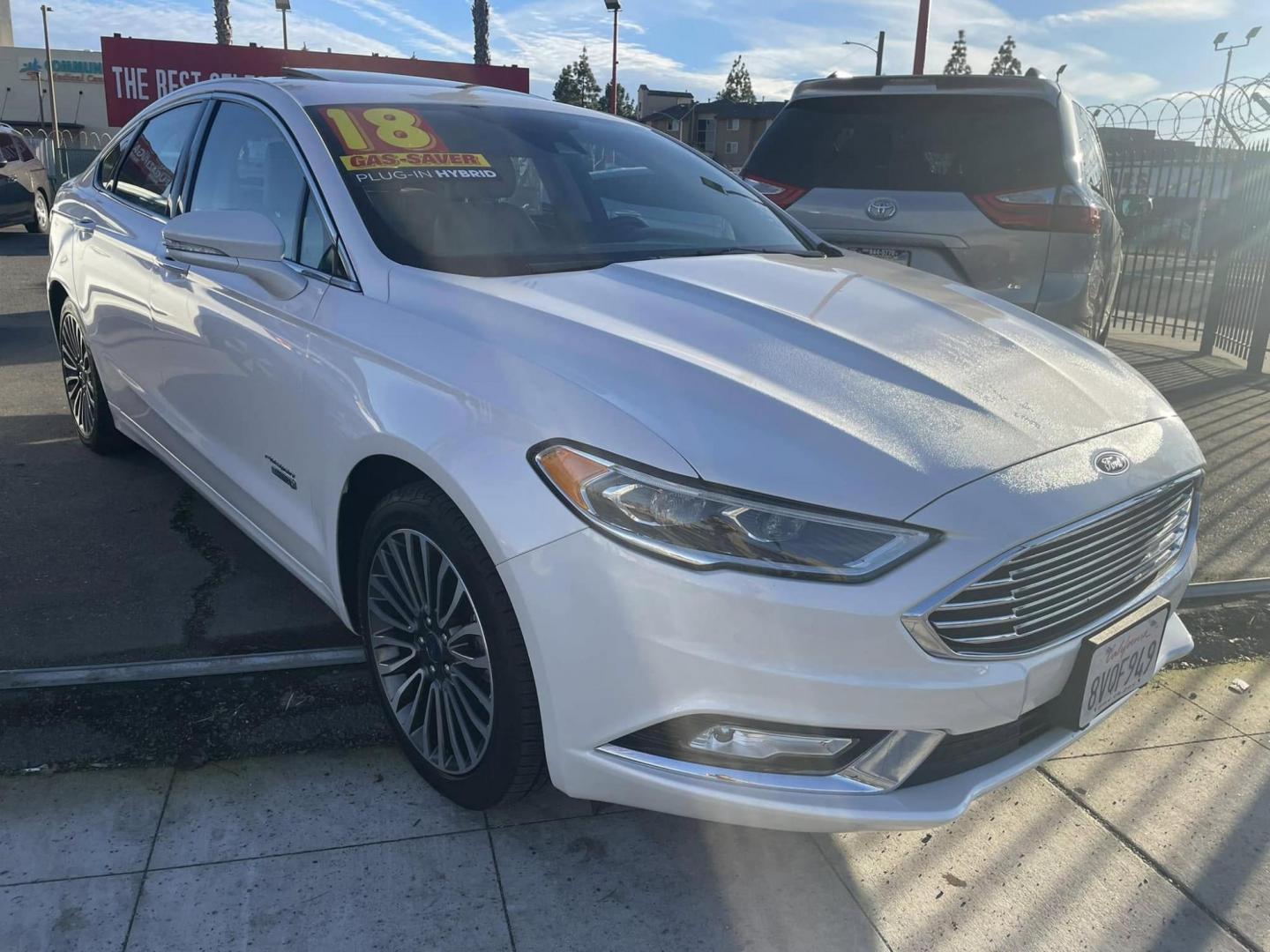 2018 WHITE Ford Fusion Energi Titanium (3FA6P0SUXJR) with an 2.0L L4 DOHC 16V HYBRID engine, CVT transmission, located at 744 E Miner Ave, Stockton, CA, 95202, (209) 944-5770, 37.956863, -121.282082 - Photo#0