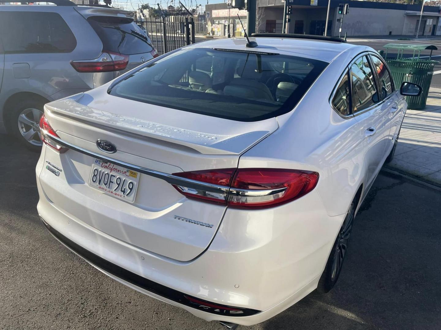 2018 WHITE Ford Fusion Energi Titanium (3FA6P0SUXJR) with an 2.0L L4 DOHC 16V HYBRID engine, CVT transmission, located at 744 E Miner Ave, Stockton, CA, 95202, (209) 944-5770, 37.956863, -121.282082 - Photo#13