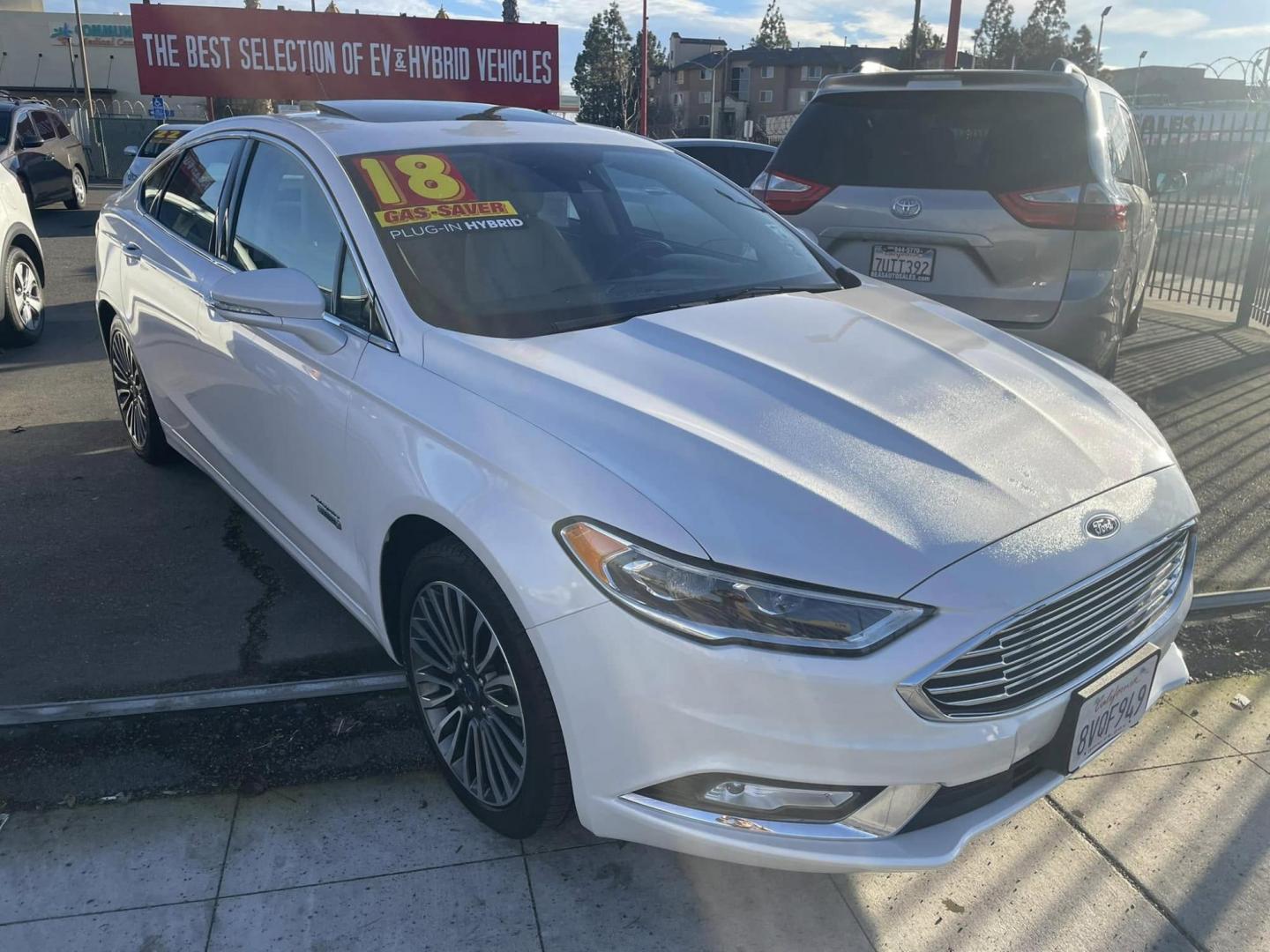 2018 WHITE Ford Fusion Energi Titanium (3FA6P0SUXJR) with an 2.0L L4 DOHC 16V HYBRID engine, CVT transmission, located at 744 E Miner Ave, Stockton, CA, 95202, (209) 944-5770, 37.956863, -121.282082 - Photo#1