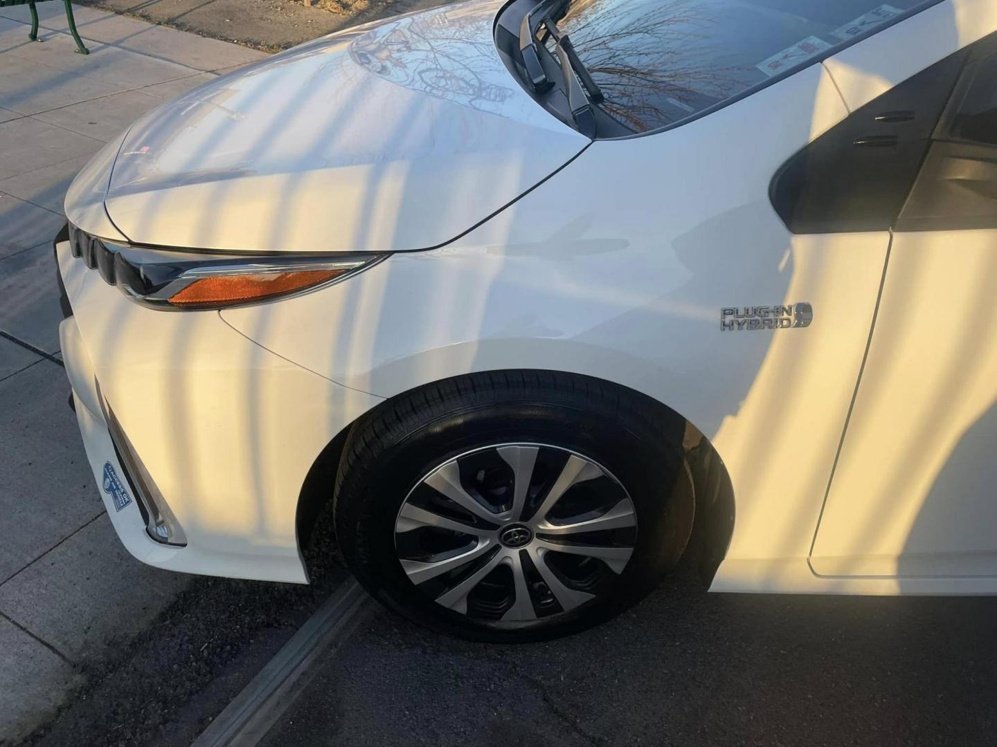 2021 WHITE Toyota Prius Prime LE (JTDKAMFP0M3) with an 1.8L L4 DOHC 16V HYBRID engine, CVT transmission, located at 744 E Miner Ave, Stockton, CA, 95202, (209) 944-5770, 37.956863, -121.282082 - Photo#4