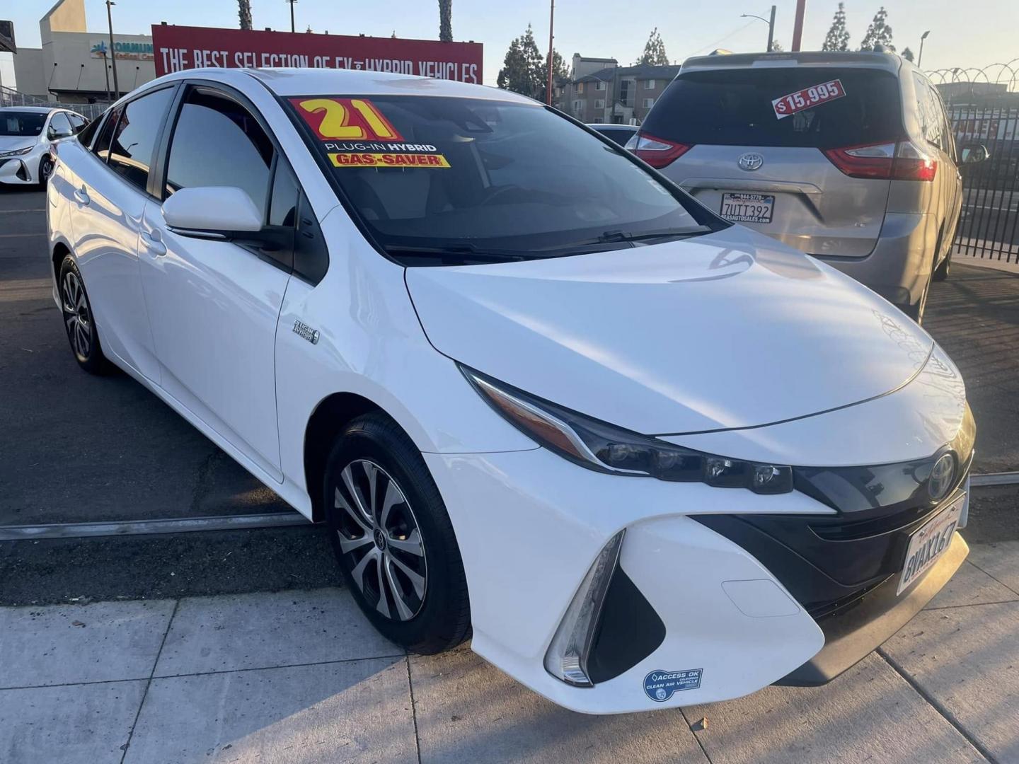 2021 WHITE Toyota Prius Prime LE (JTDKAMFP0M3) with an 1.8L L4 DOHC 16V HYBRID engine, CVT transmission, located at 744 E Miner Ave, Stockton, CA, 95202, (209) 944-5770, 37.956863, -121.282082 - Photo#1